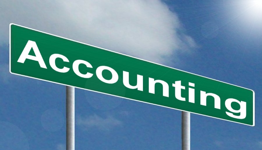 Street sign, white letters on green background, reading, "Accounting."