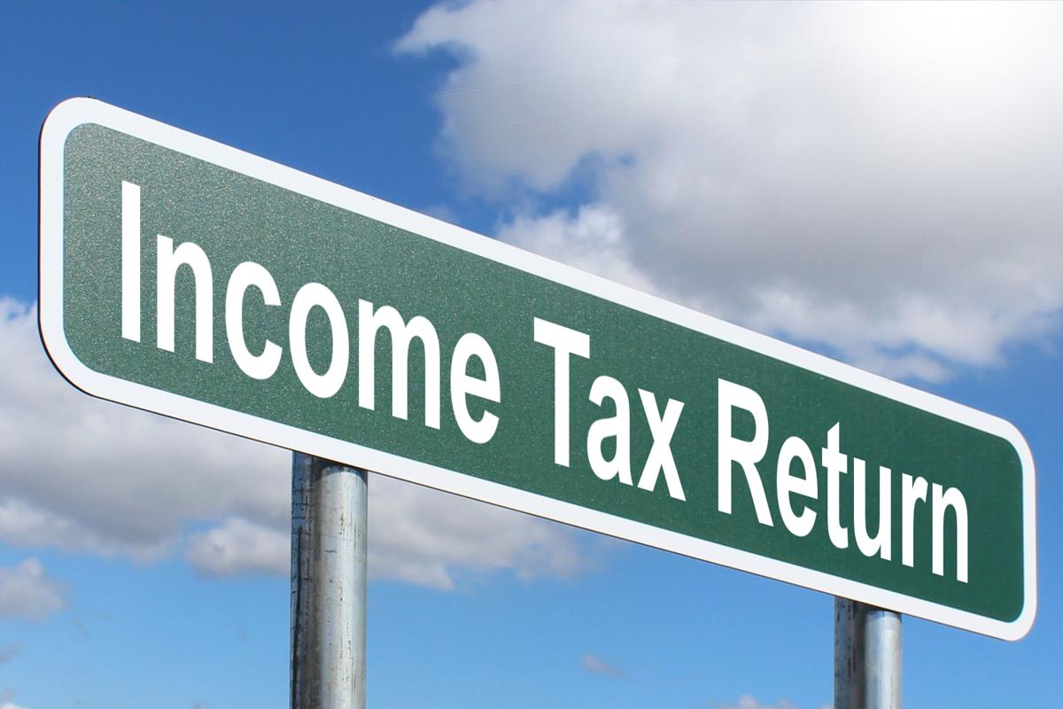 income-tax-return-free-of-charge-creative-commons-green-highway-sign