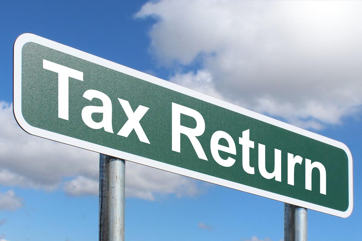 tax-return-free-of-charge-creative-commons-green-highway-sign-image